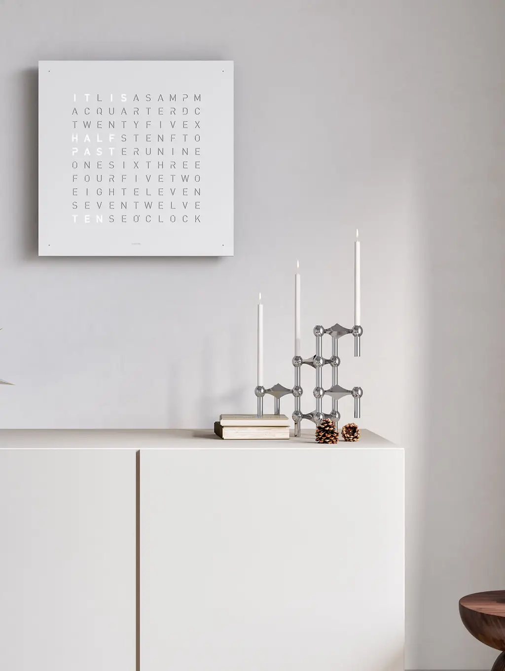 QLOCKTWO EARTH 45 White Pepper word clock with white textured surface mounted in a bright interior