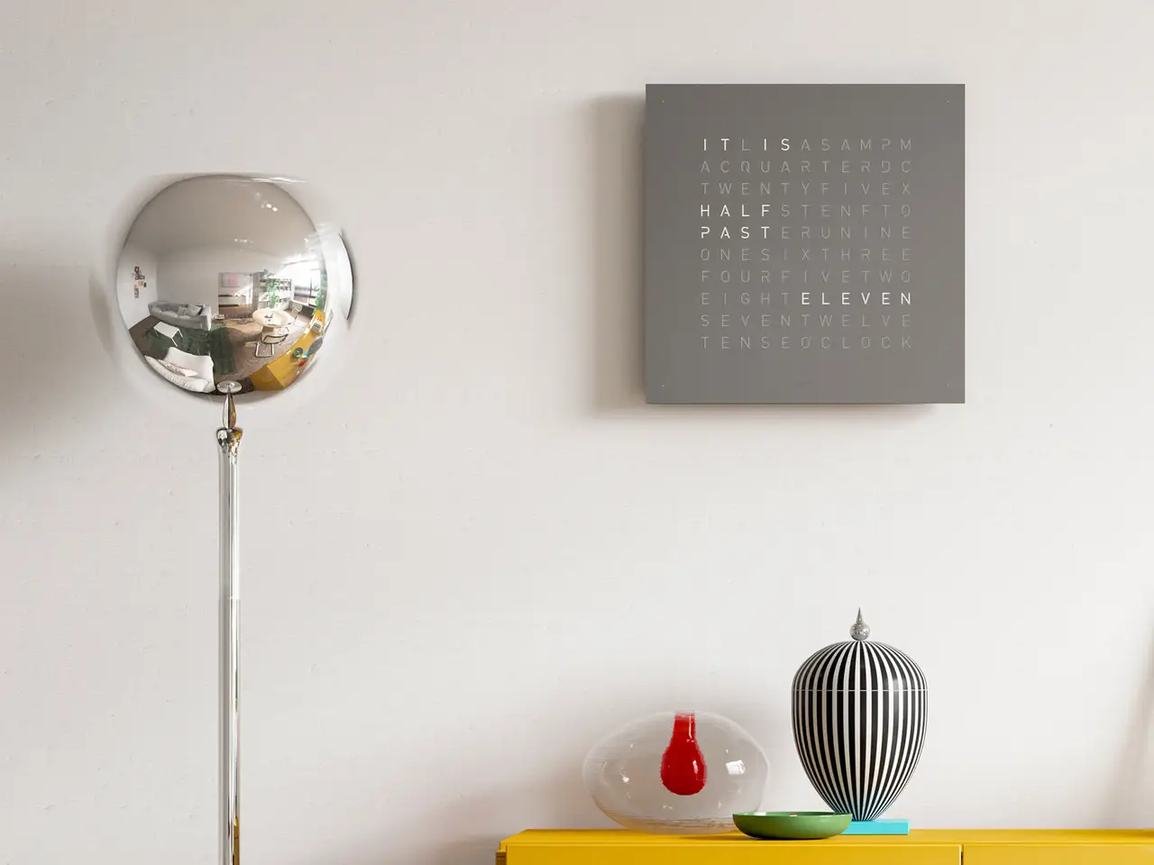 QLOCKTWO EARTH 45 Grey Pepper word clock with grey textured surface in a contemporary interior