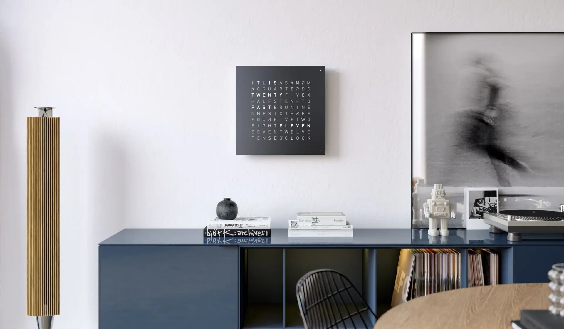 QLOCKTWO EARTH 45 BLACK PEPPER luxury wall clock in modern loft apartment